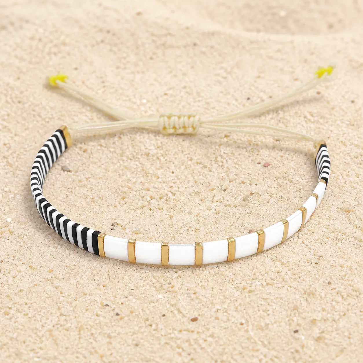 Tila beaded bracelet on light sand