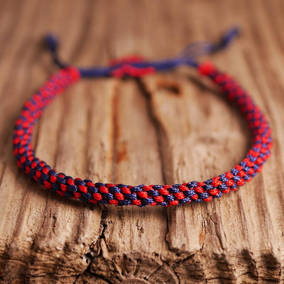 Buddhistisches Knoten Armband in blau & rot