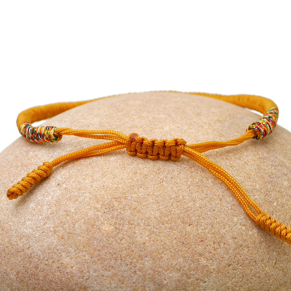 Tibetisches Armband in senfgelb