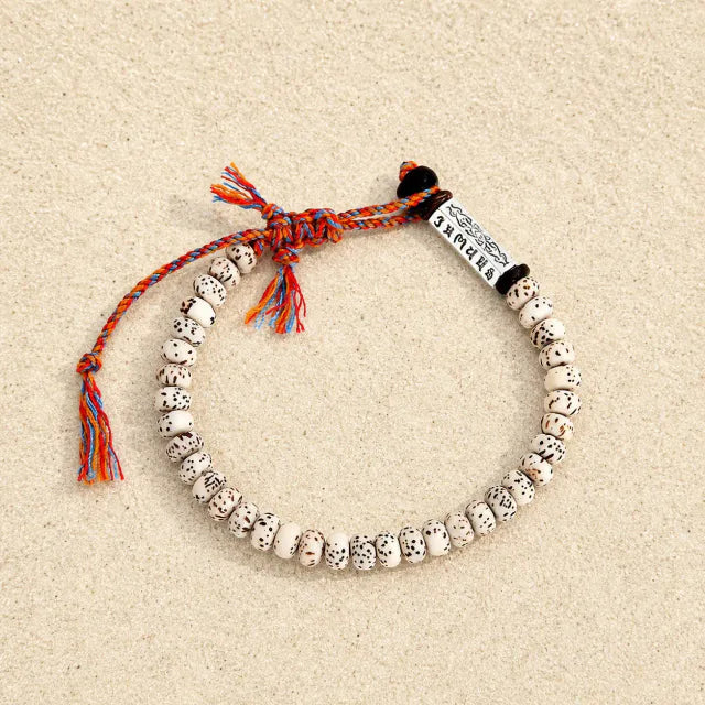 Bodhi handgeknüpftes Perlenarmband