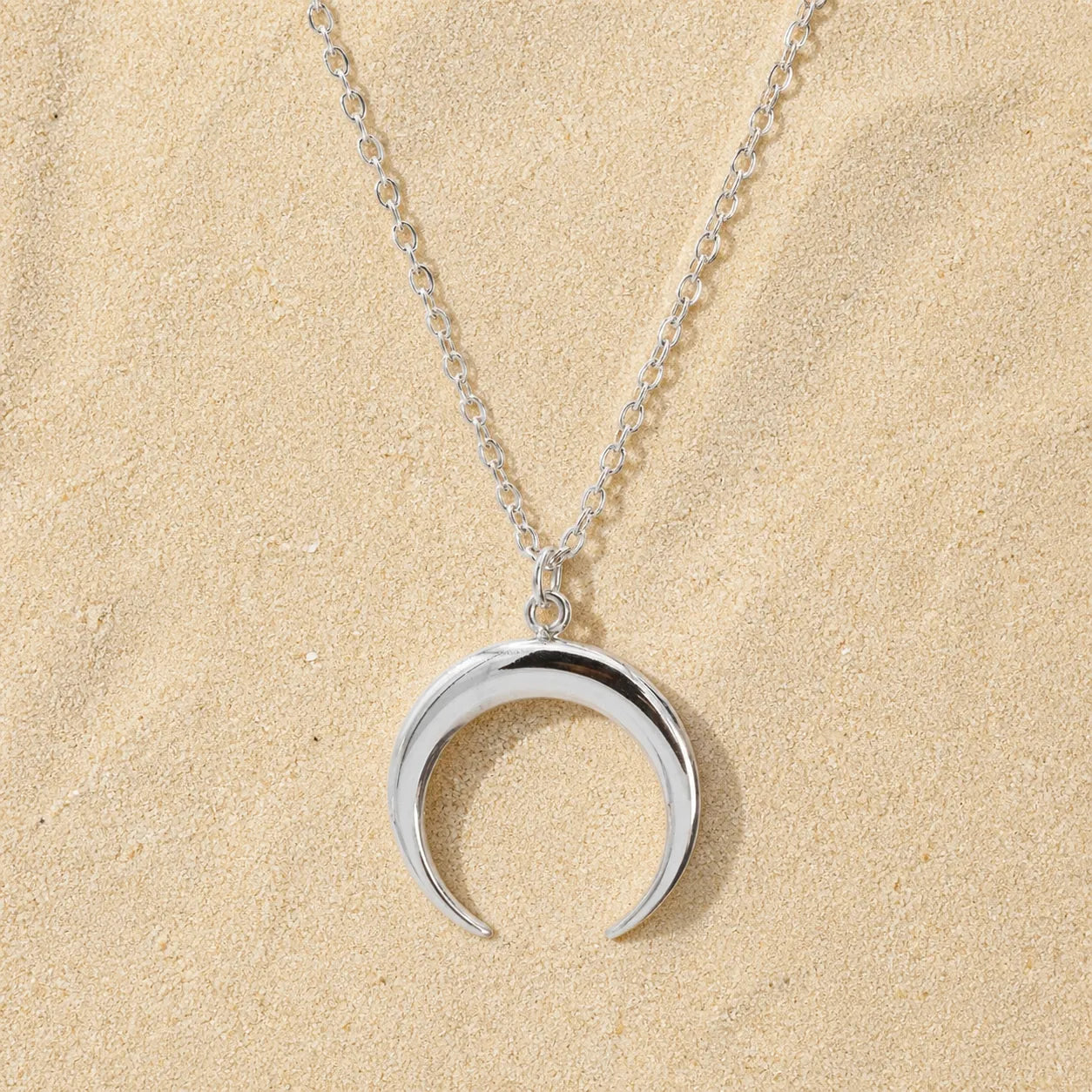Double Horn Necklace Silver on light sand