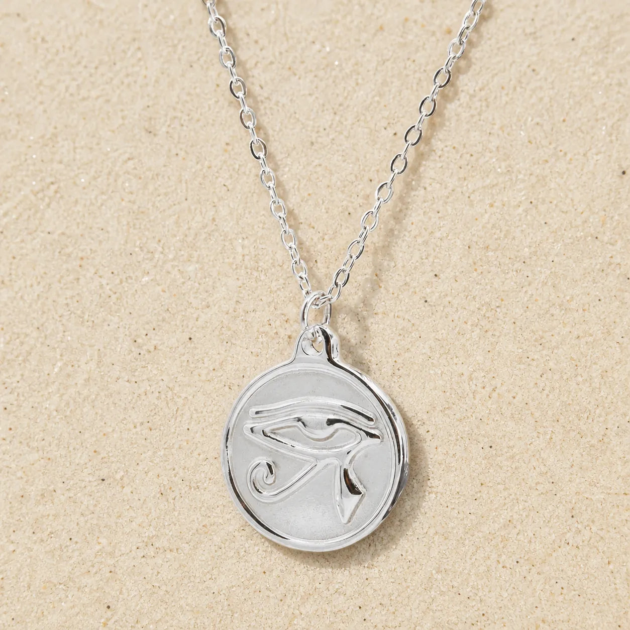 Horus Eye Necklace Silver on light sand