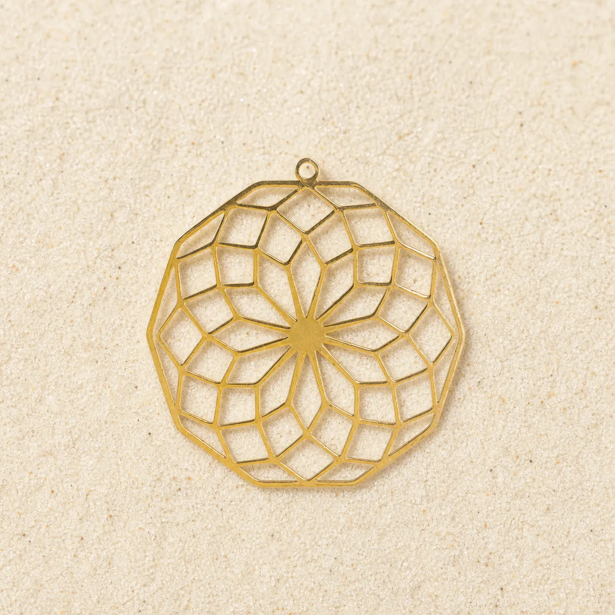 Flower Pendant Gold on light sand