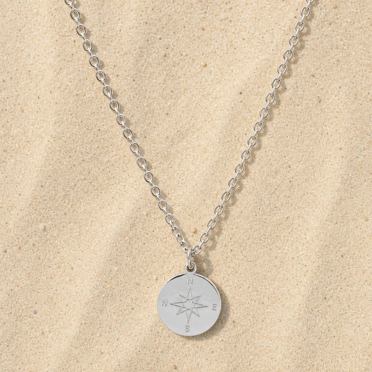 Compass Necklace Silver on light sand