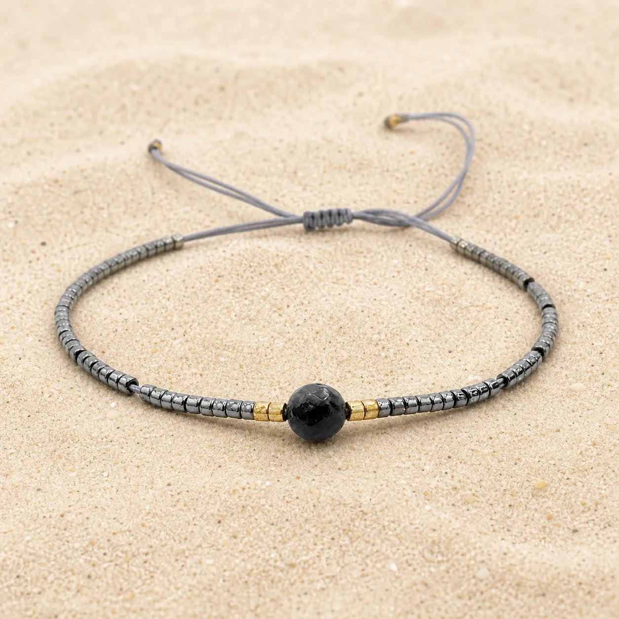 Seed beads bracelet grey on light sand