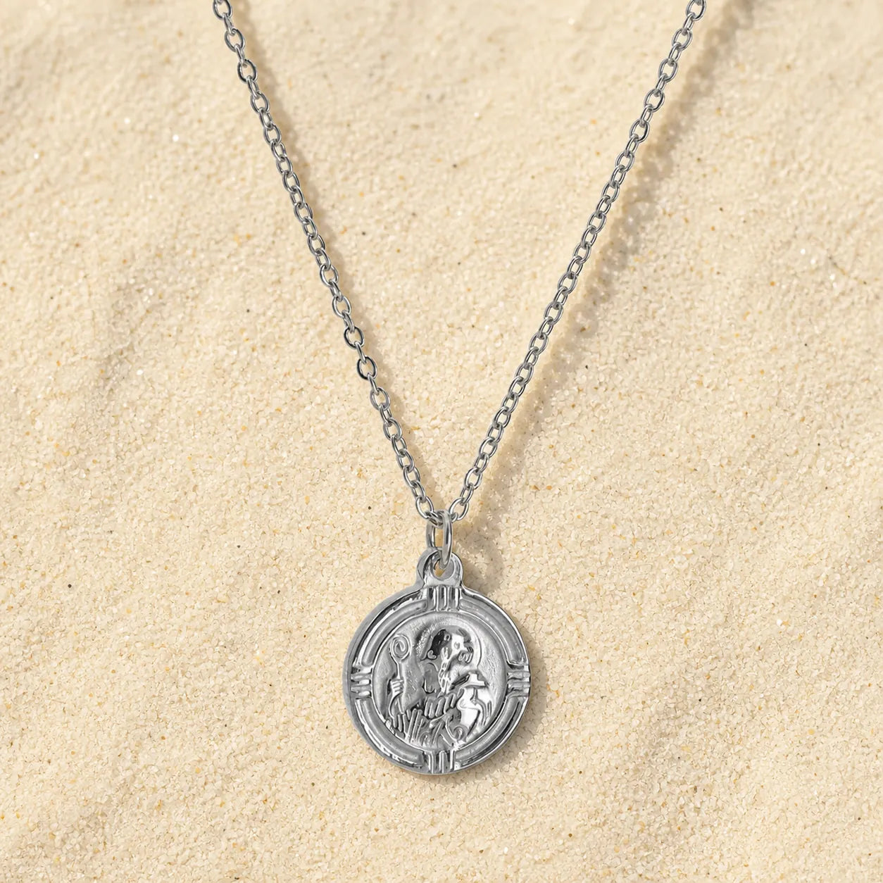 Saint Benedict necklace silver on light sand