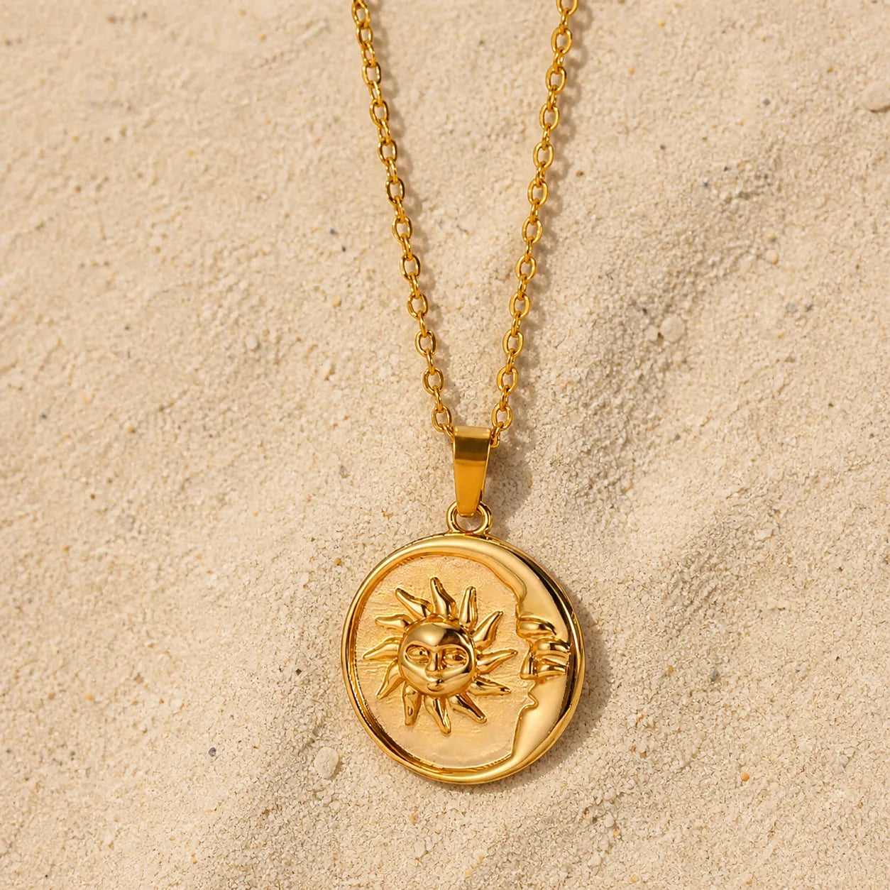 Crescent Necklace Gold on light sand