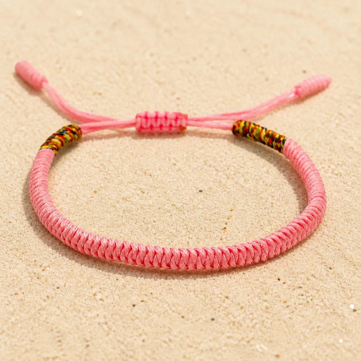Tibetan bracelet in pink on light sand