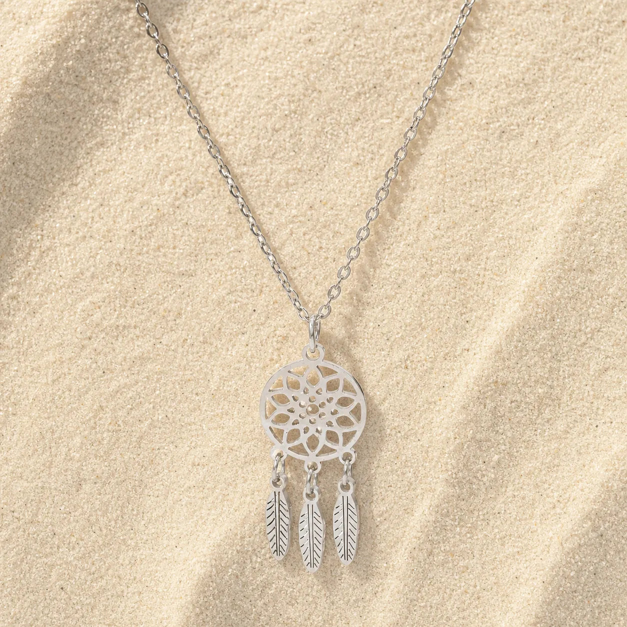 Dream Catcher Necklace Silver on light sand