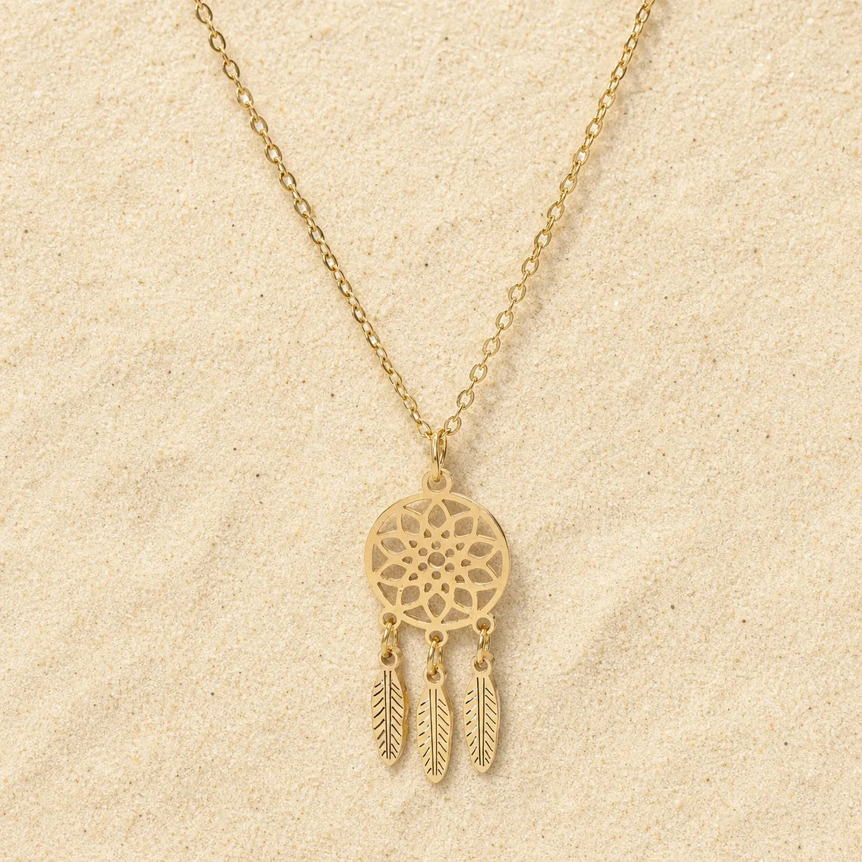 Dream Catcher Necklace Gold on light sand