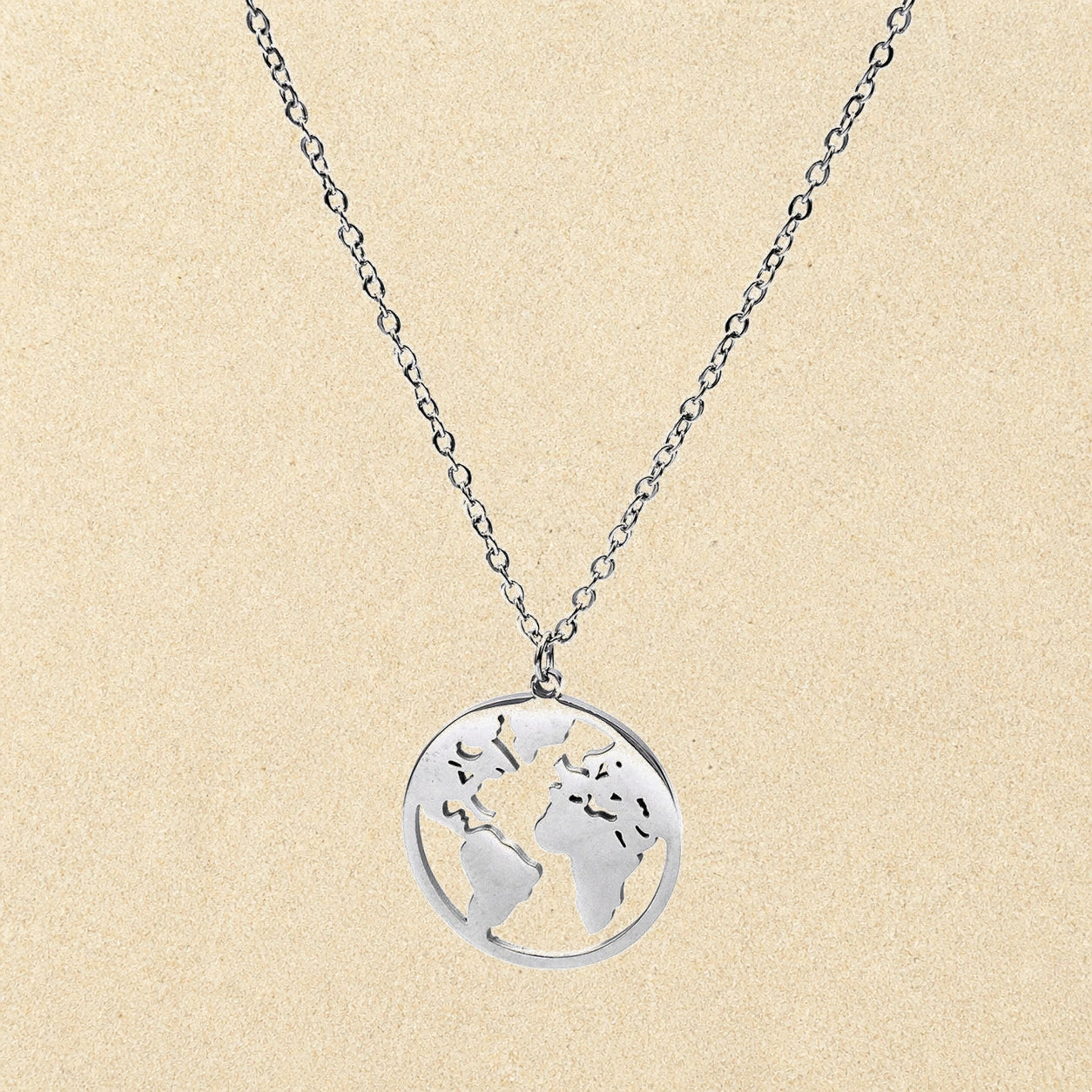 Globe Necklace Silver on light sand